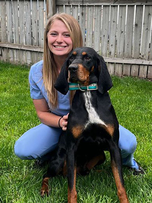 Makayla Wilder with a cute hound